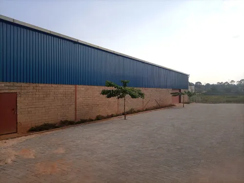 Modern warehouse space for rent in Kampala with ample parking, green spaces and secure premises