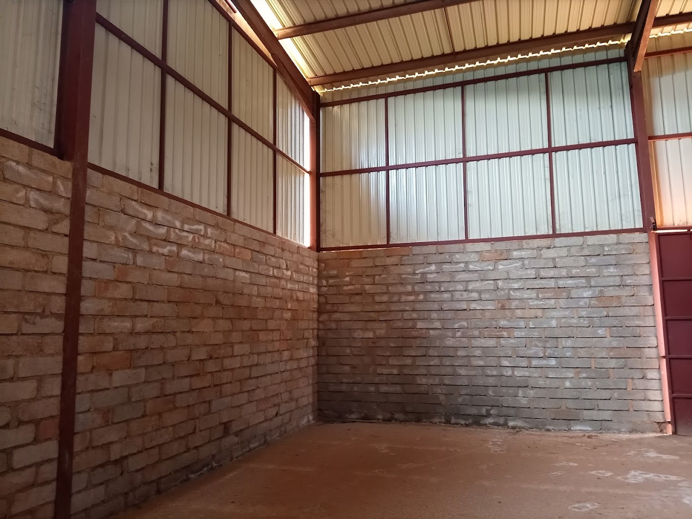 Clean, well-lit warehouse space for rent in Kampala ready for business operations