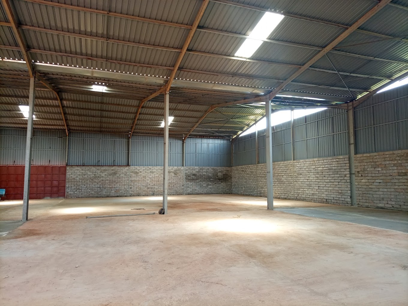 Interior of pio ltd spacious industrial and business warehouse for rent in Kampala with high ceilings and optimized storage