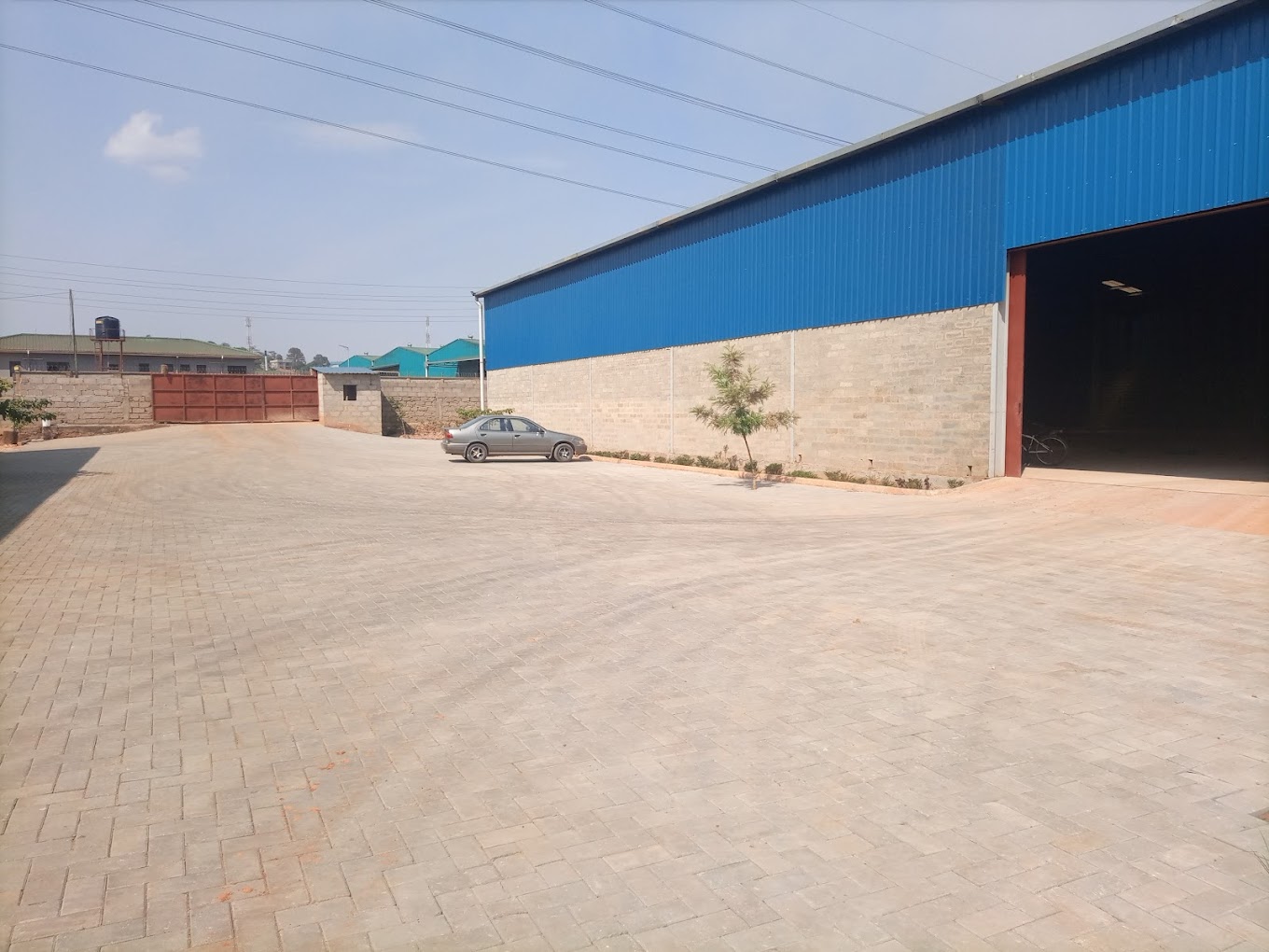 Front facade of industrial warehouse space for rent in Kampala, ideal for logistics and storage